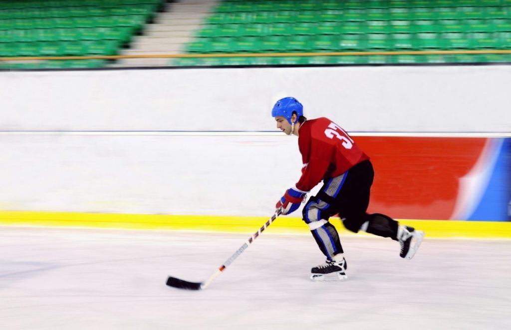 a left winger in hockey skating fast
