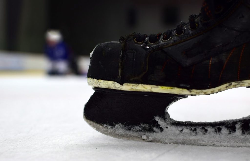 An ice hockey skate: hockey skates vs figure skates